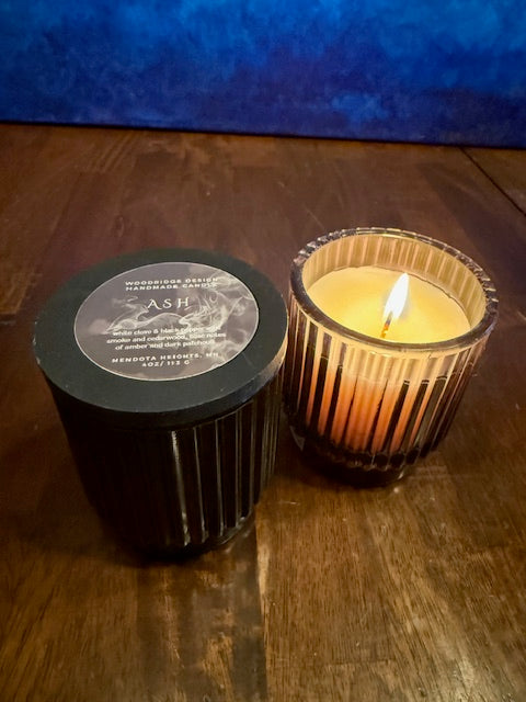 Small lidded glass candle